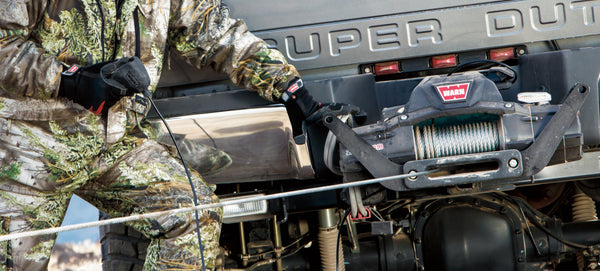RECOGER Y ENROLLAR EL CABLE DEL WINCH