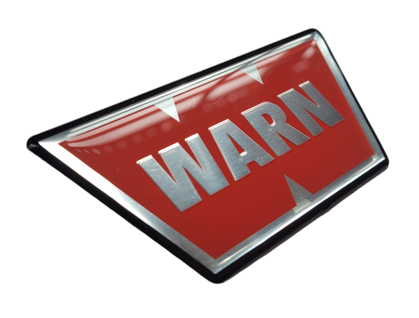 Placa adhesiva insignia WARN.