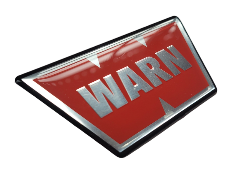 Placa adhesiva insignia WARN.